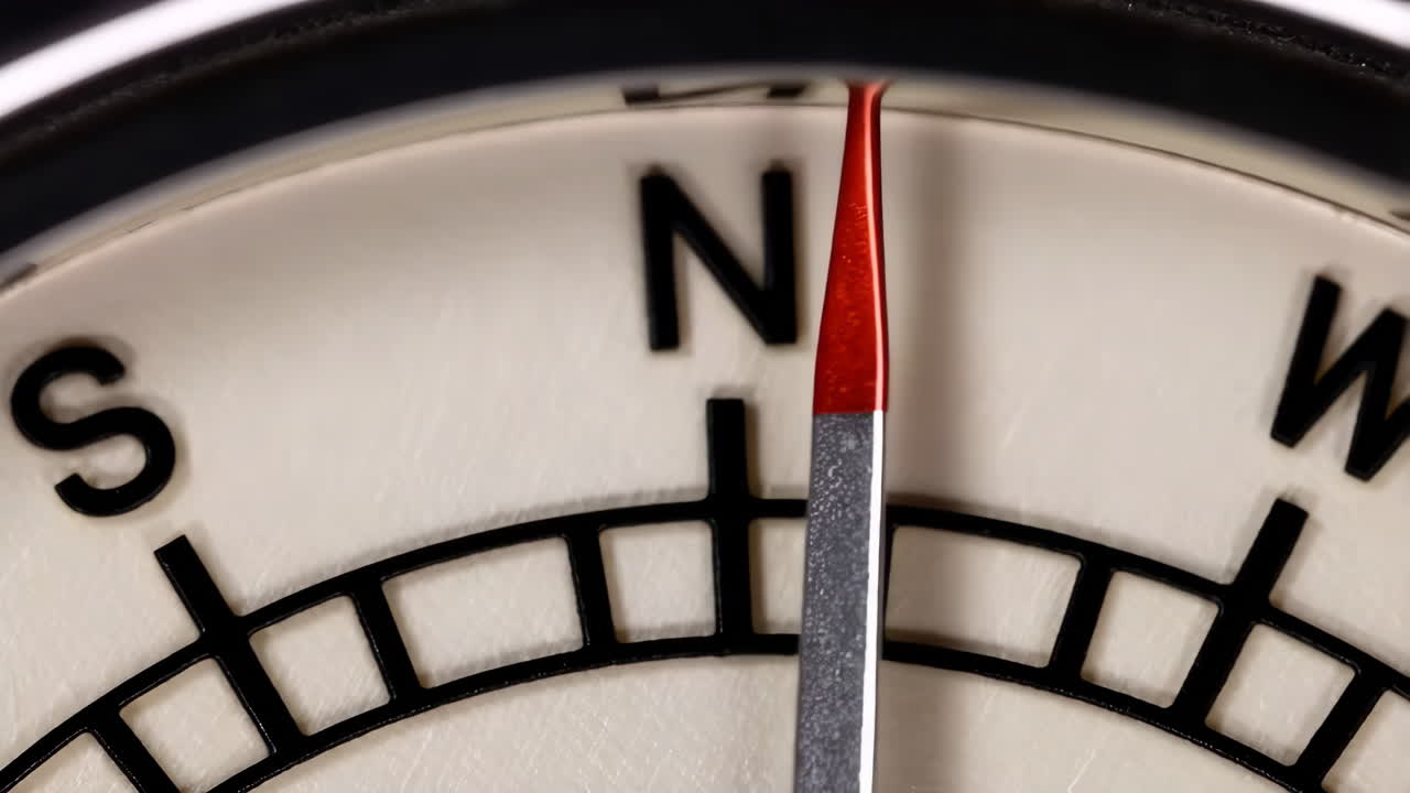 Close-up of a Compass Needle Pointing North