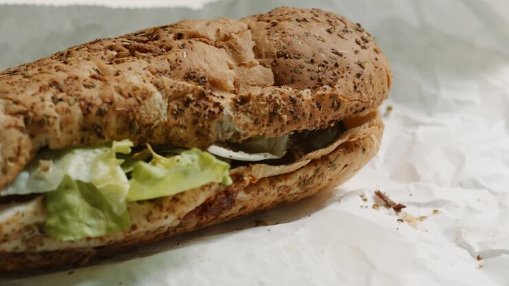 Delicious Sub Sandwich Close Up with Steak Lettuce Cucumber