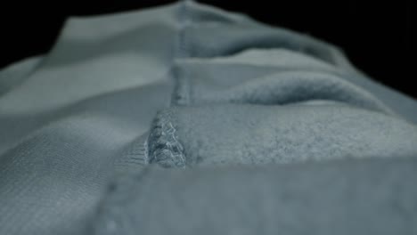 close-up of a light blue sweatshirt