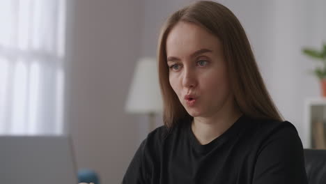 female-professional-and-specialist-is-communicating-by-online-video-chat-at-distant-meeting-with-colleagues-and-partners-closeup-portrait-in-home-office