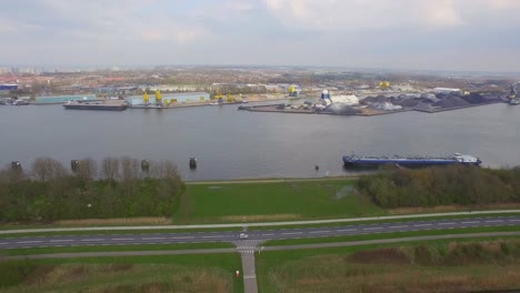 Cargo-ships-at-the-port-of-Terneuzen,-Netherlands,-going-to-Ghent-in-Belgium