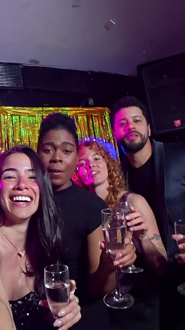 Friends celebrating with champagne at a party