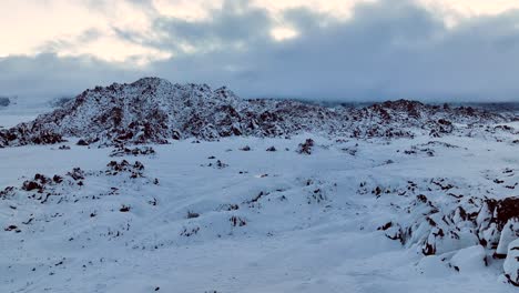 Wide-drone-shot-of-the-Sierra-mountains-and-the-Alabama-hills,-California-with-fresh-snow