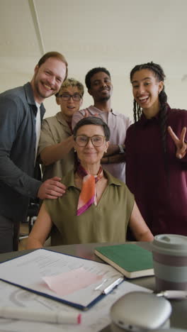 diverse professional team smiling together in an office setting