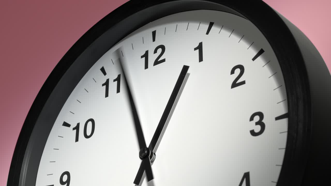 Clock Face on Rosy Rose Pink Wall in Time Lapse