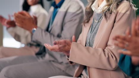 audience clapping at a business event