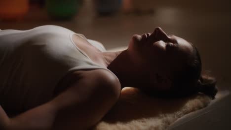 woman meditating in yoga pose