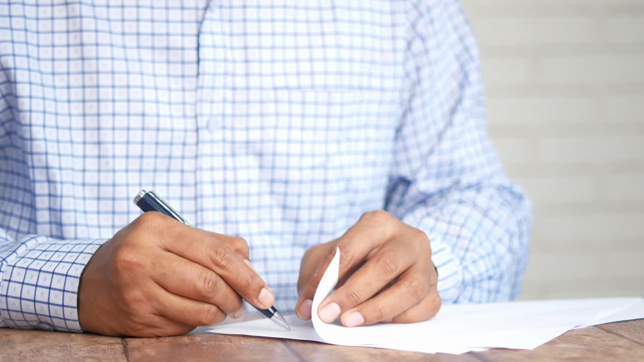 Person signing a document