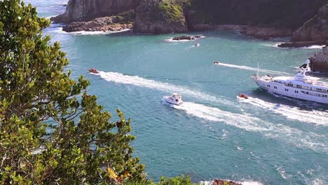 yacht mv katharine leaves knysna, south africa on a sunny summer day