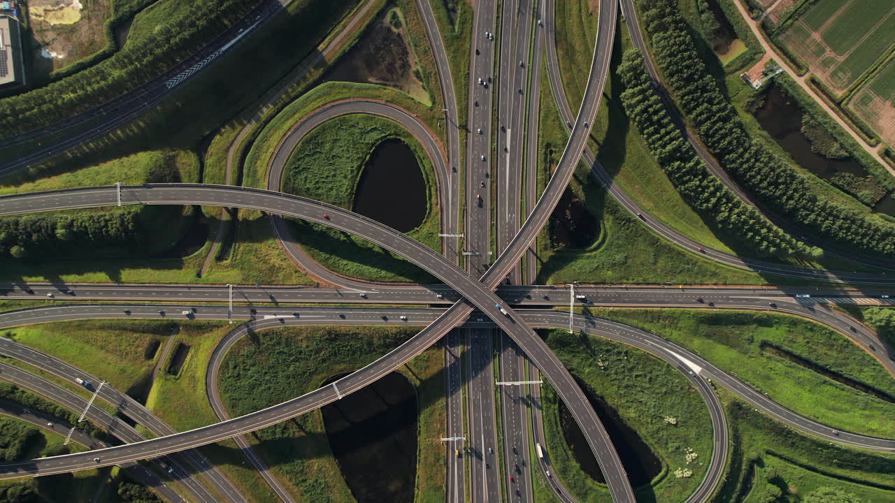 Traffic Junction At Ridderkerk Interchange In South Holland, Netherlands. aerial topdown shot