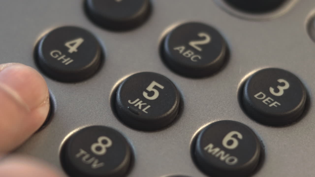 Closeup Telephone Keypad With Finger Pressing Numbers, Office Desk Environment, Illuminated Round Buttons, . Media