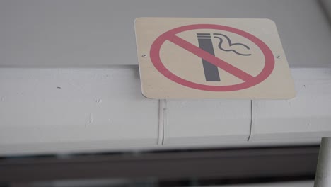 no smoking sign on a wall