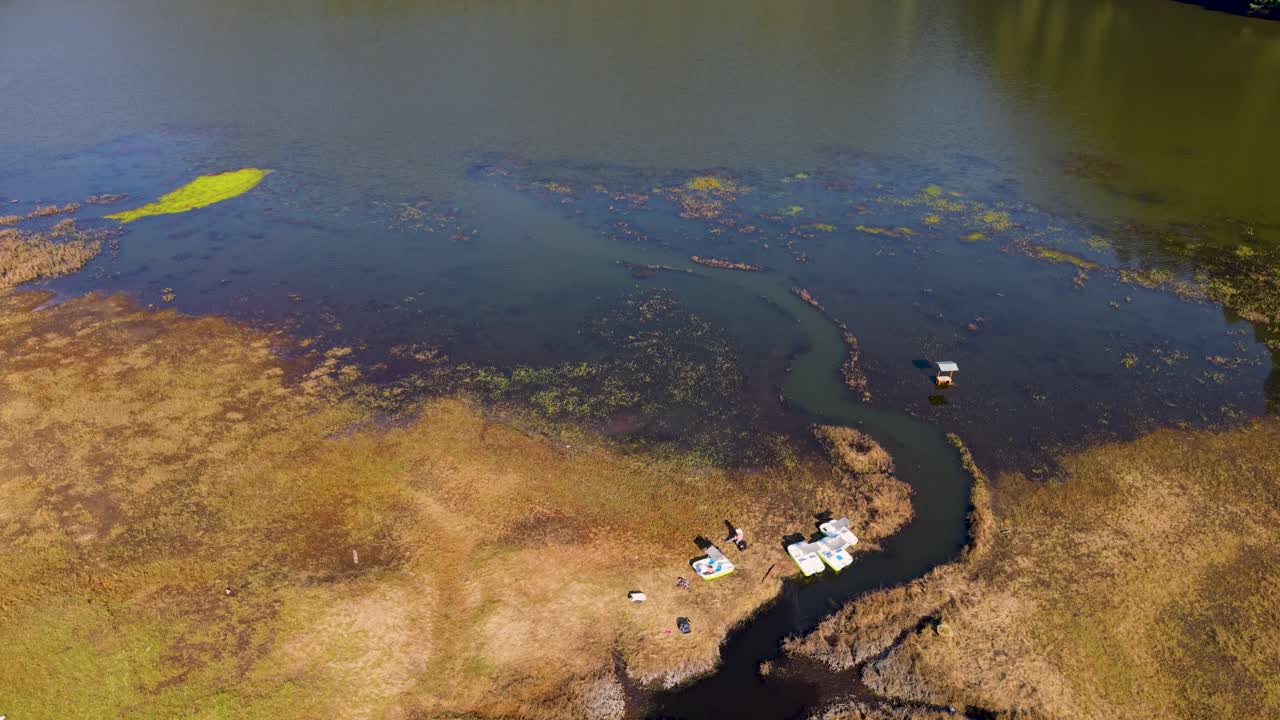 Overhead drone shot of forested Zempoala Lakes in Mexico