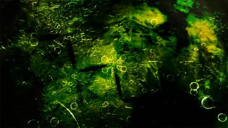 dark green texture and choreographed dancing glass sphere bubbles - 4k seamless loop motion background animation