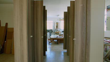 long zoom in shot of two wardrobes facing