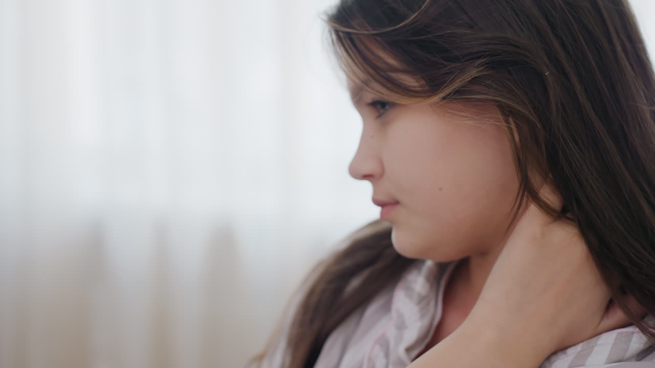 Quiet Girl In Sunlit Room, Serene Young Lady With Eyes Shut Embracing Morning Tranquility, Girl With Closed Eyes Experiences Tranquil Moment During Bright Domestic Sunrise Of Reflection