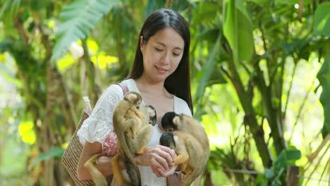 woman and squirrel monkeys