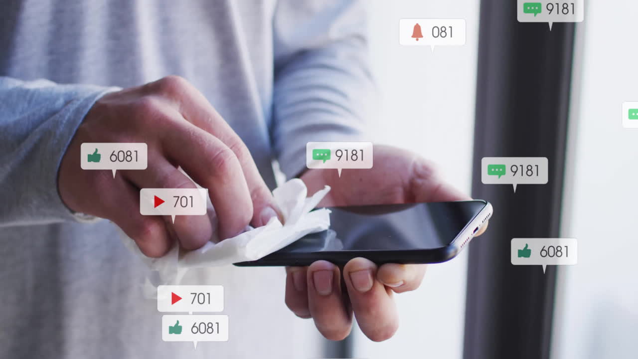 Cleaning smartphone screen, social media notifications animation over hands