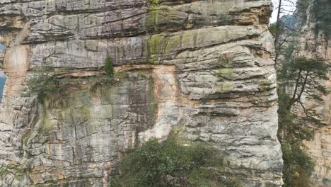 close orbiting shot of a sandstone column in zhangjiajie national park