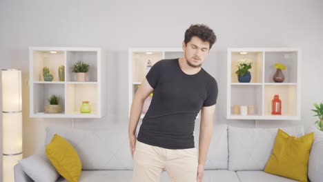 man stretching his waist doing exercise.