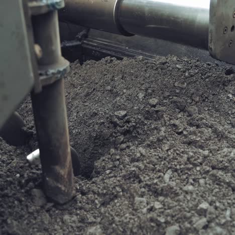 asphalt unloaded from wheelbarrow