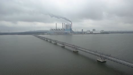 aerial view of konin power plant in poland, sky dramatic polluted post apocalyptic sky