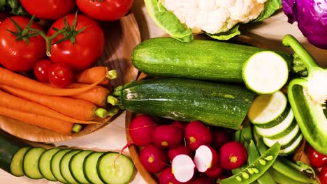 assorted vegetables arranged on a black background