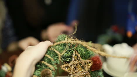 christmas ornament made by hands. holy christmas, a woman making a beautiful home decorations