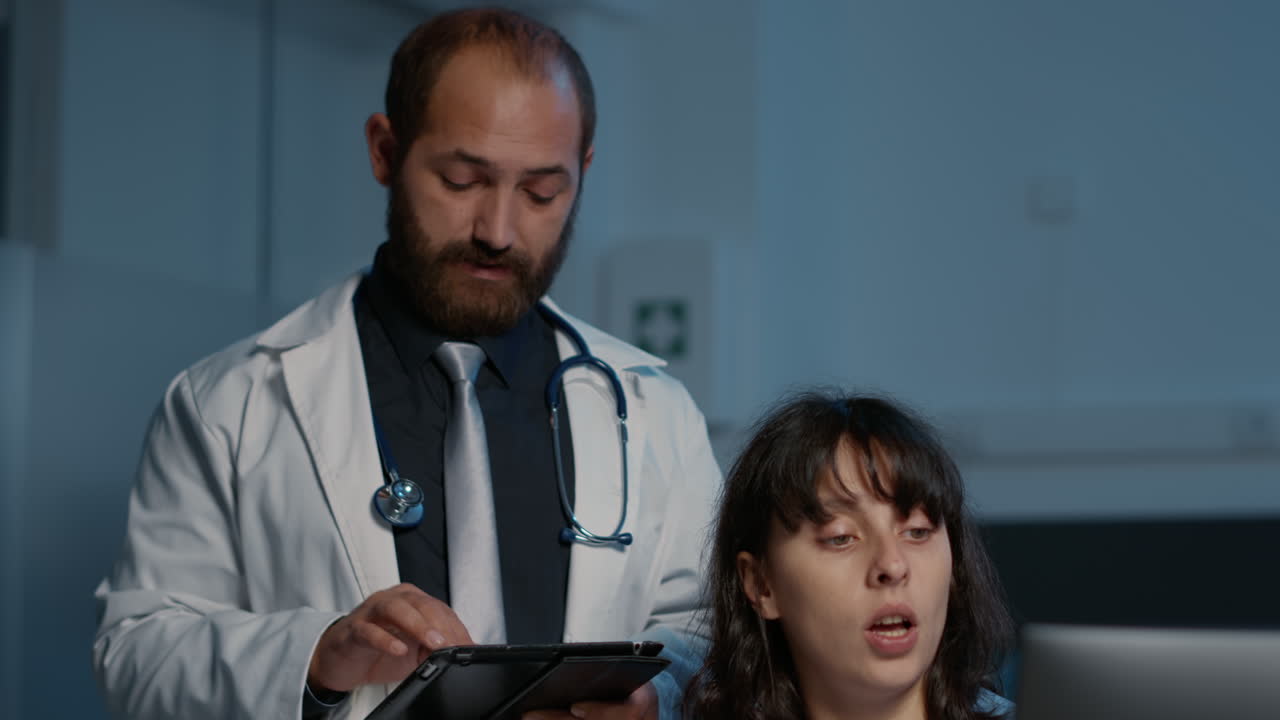 Medical professionals collaborating on patient care using digital tools
