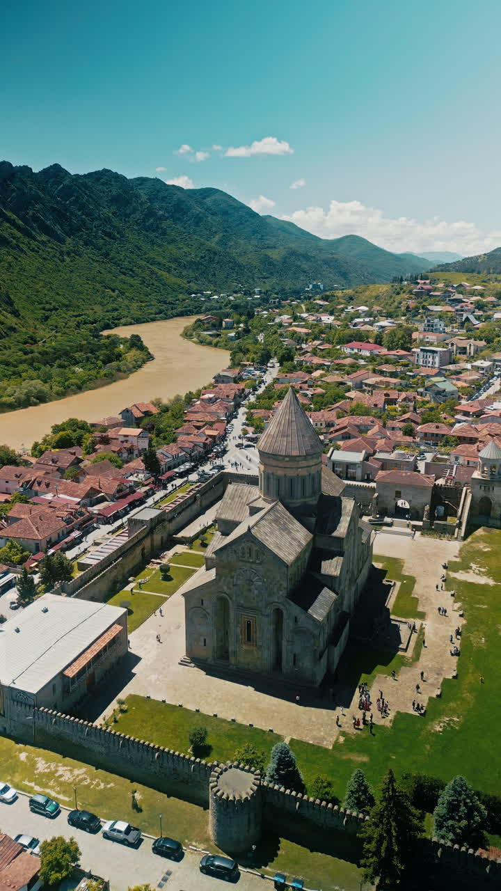 Aerial View of a Georgian Cathedral and Town