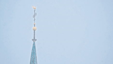 tower spire in the snow
