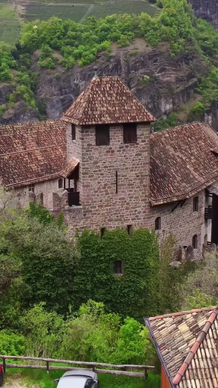 Close-up view of the tower at Runkelstein Castle, a medieval fortress near Bolzano, showcasing its historical architecture.