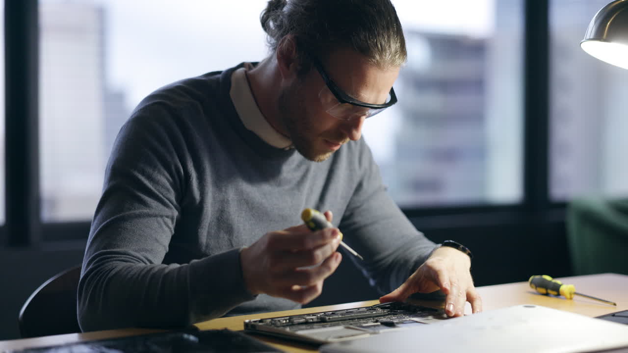 Hardware, maintenance and screwdriver with man