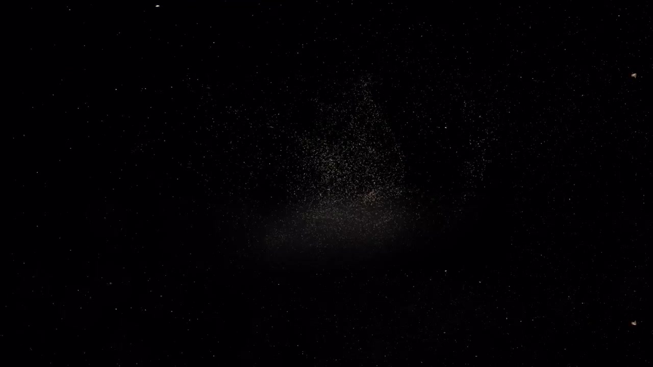 Animazione di galassia con particelle su sfondo nero.