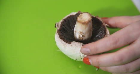 cuting slicing mushrooms in the kitchen for cooking 3