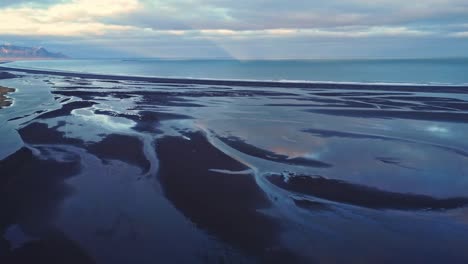 river estuary near sea at sunset