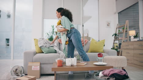 Cleaning,-living-room-and-woman-at-home-with-maid