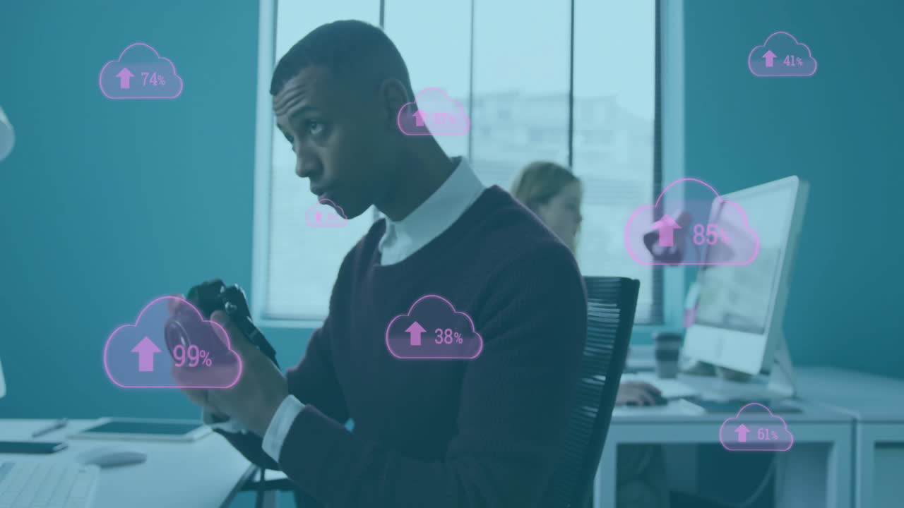 Animation of clouds with percent growing over african american businessman using camera