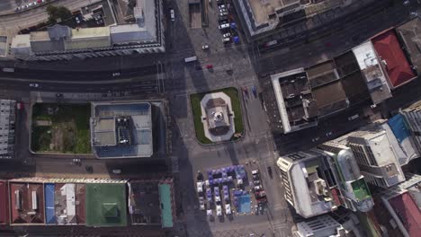 aerial birds eye view over plaza sotomayor with spinning ascending shot reveal of the chilean navy building