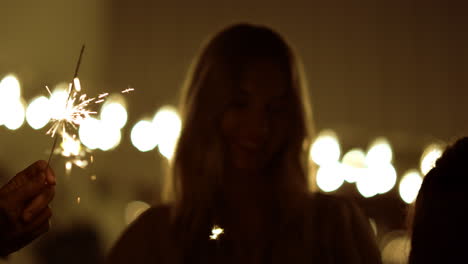 Portrait-of-happy-friends-celebrating-new-year-outdoors