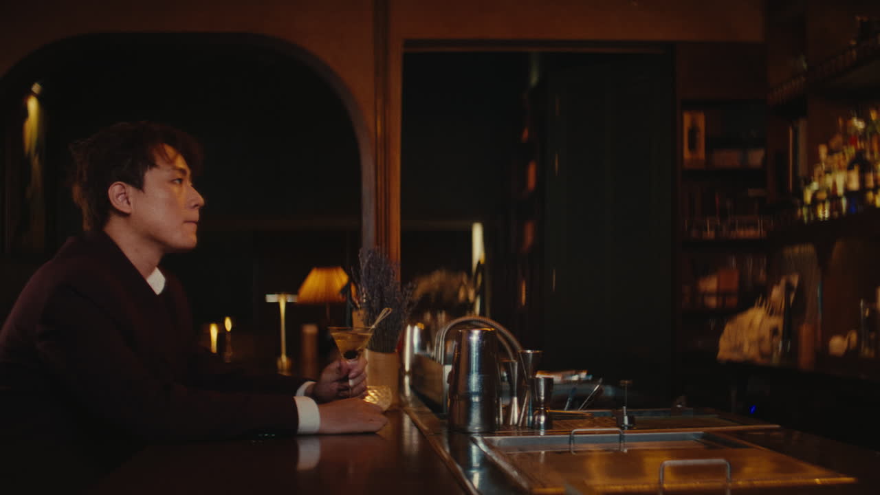 Stylish Man at a Dark Bar