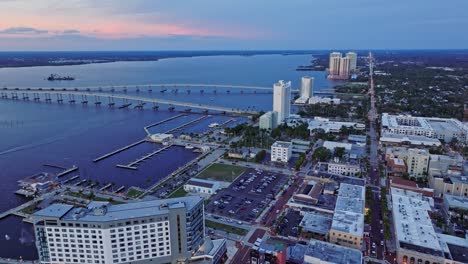 aerial view of buildings and residences around the fort myers bridge over the ocean in florida, united states