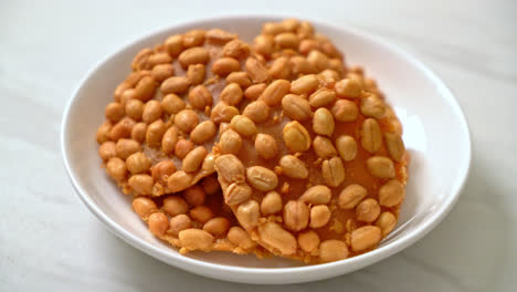 thai fried peanut cookies on plate