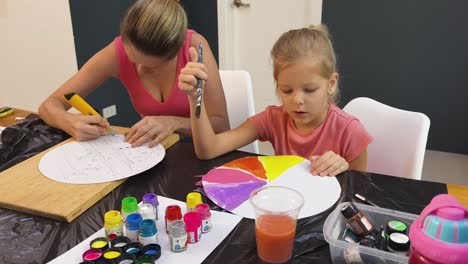 mother and daughter enjoying an art class