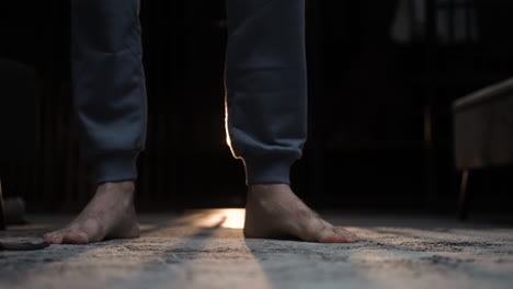 Closeup of man&#039;s feet on the floor