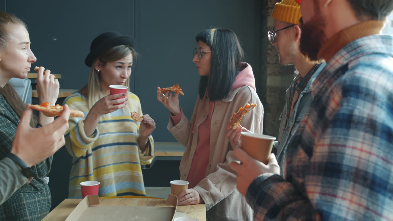 Friends Enjoying Pizza and Coffee