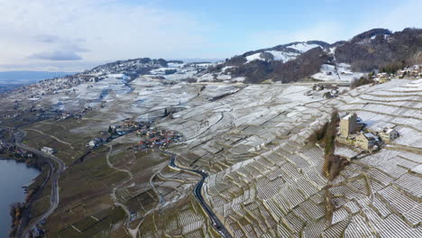 Medieval-Tower-Of-Marsens-In-Lavaux-Vineyard-With-Epesses-And-Riex-Villages-In-Background-During-Winter-In-Vaud,-Switzerland