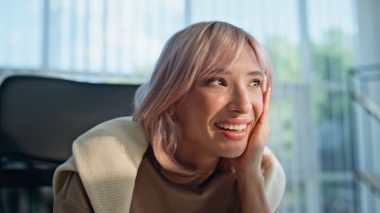 Manager hands taking smartphone reading great news at light workplace closeup