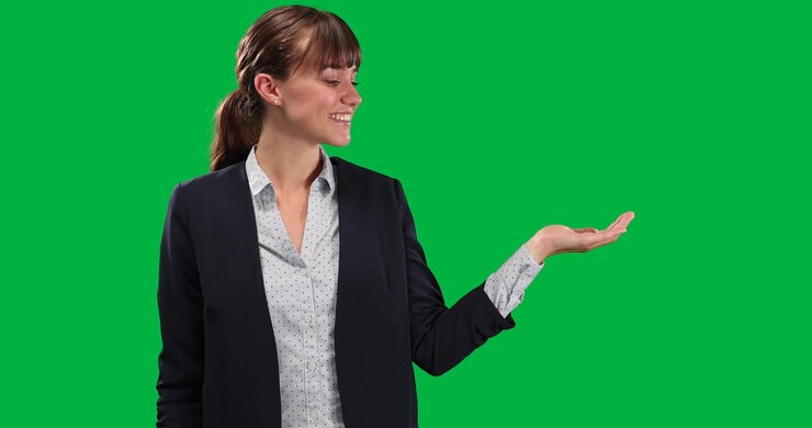 Business woman on green background