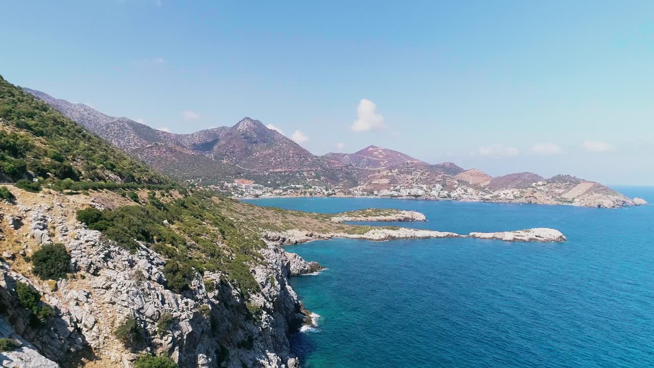 A shot from a drone of a road on the coast of the Greek island of Crete